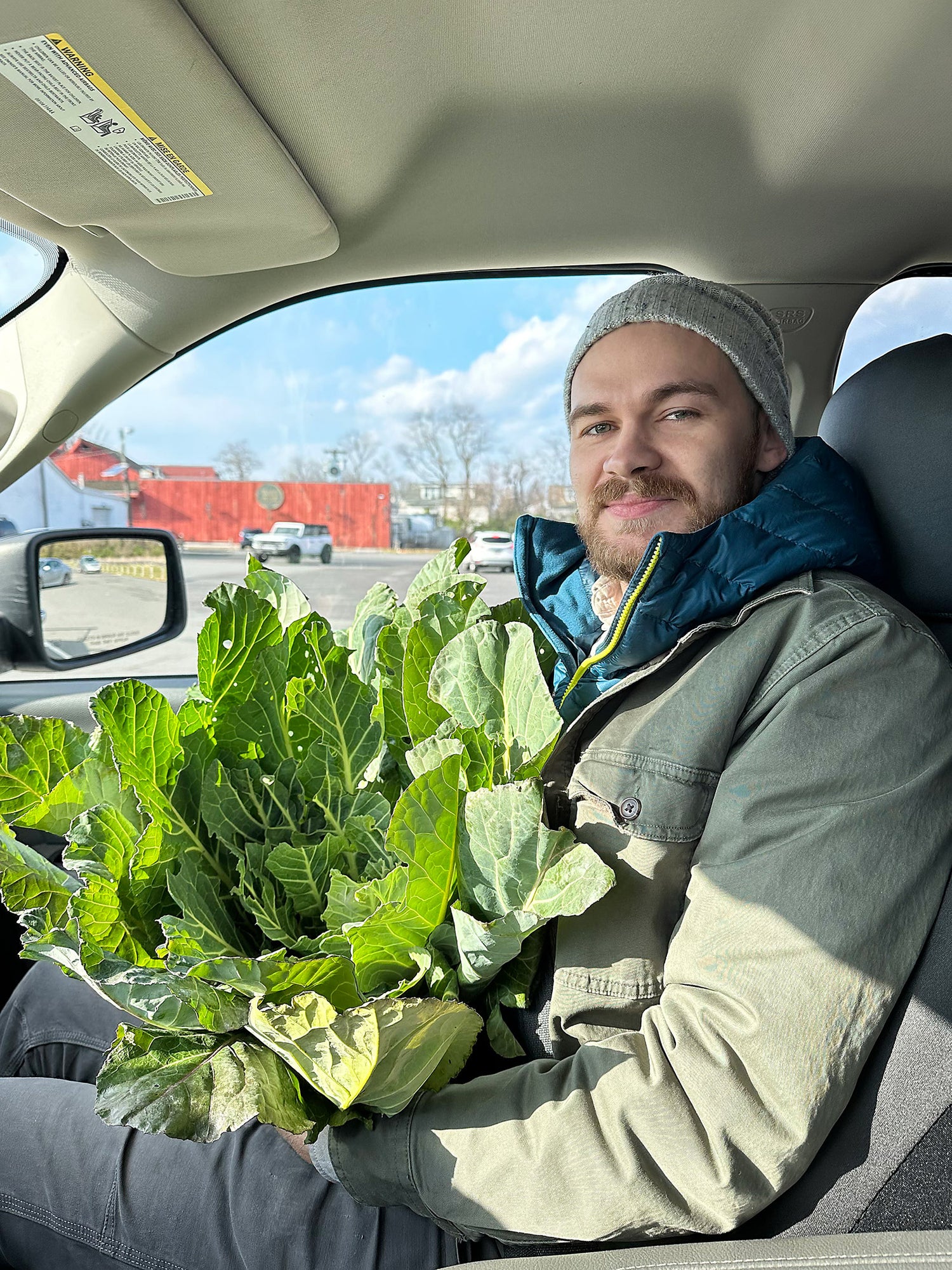 James with a big bouquet of fresh greens