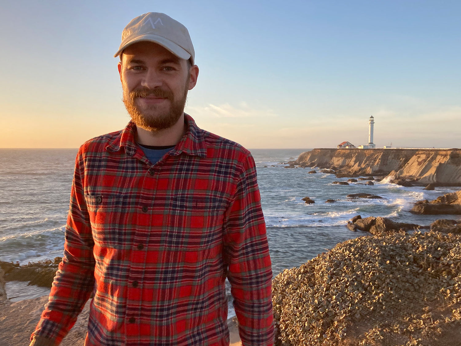 James Baylis in front of light house