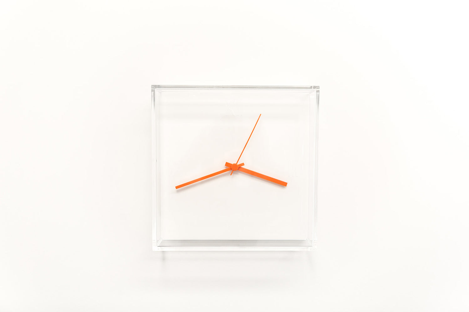 white clock with orange hands